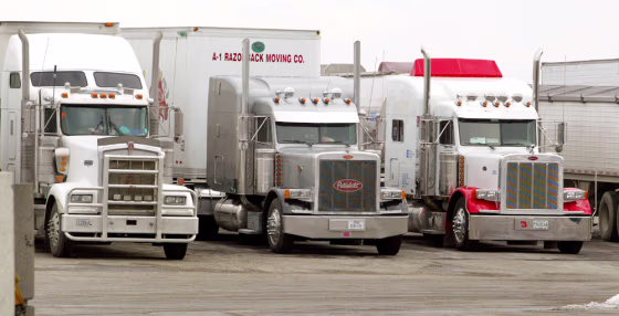 Executives and analysts for the freight industry said truck drivers' wages would have to increase from the current annual $40,000-$58,000 range to more than $60,000 if road freight carriers were to successfully compete for workers in a growing labor market. 