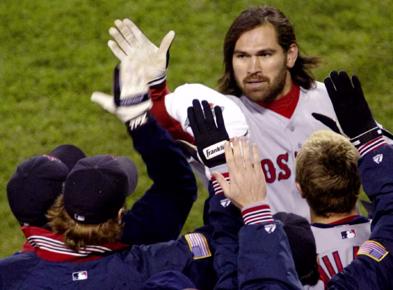 Red Sox Damon congratulated on second home run in Game 7 of the ALCS against Yankees