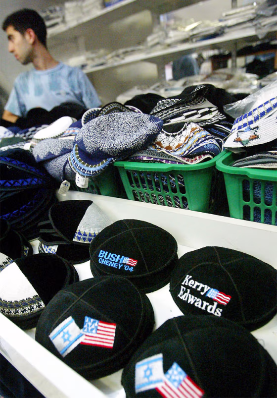 A display of yarmulkes at a store in the ultra-orthodox Jewish neighborhood of Mea Shearim in Jerusalem offers versions with the names of the U.S. presidential candidates.