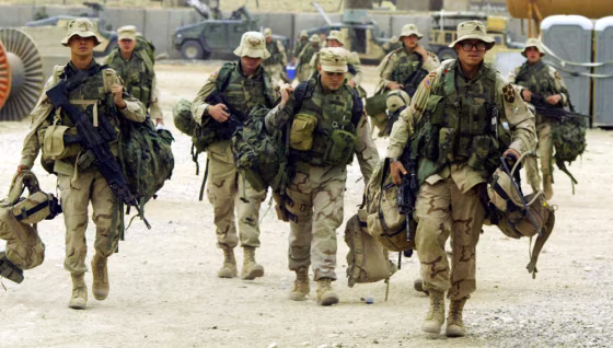 US Army soldiers arrive at a combat outp