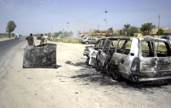 The roads around Latifiyah, an Iraqi city in the region known as "the triangle of death," are littered with burned and bullet-riddled wrecks.