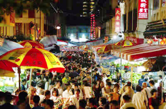 Thousands of well-wishers flood the streets of Singapore during a Lunar New Year celebration.