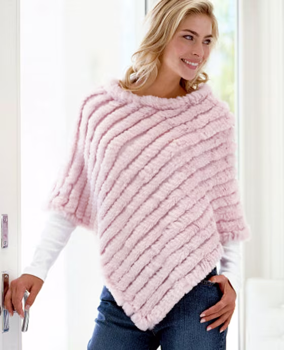 "The poncho is back," announces one holiday sales pitch from J.C. Penney. Their new take features cables made from rabbit fur.