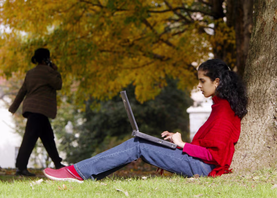 Emory University freshman Suhas Sridharan checks e-mail on her laptop computer via a wireless connection on the Atlanta campus.