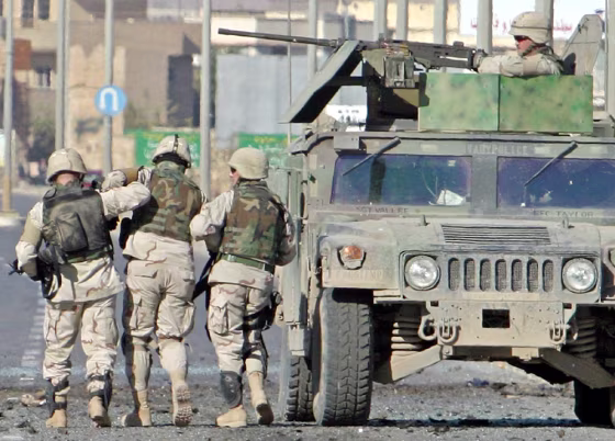 US soldiers guide wounded colleague at scene of attack in Mosul