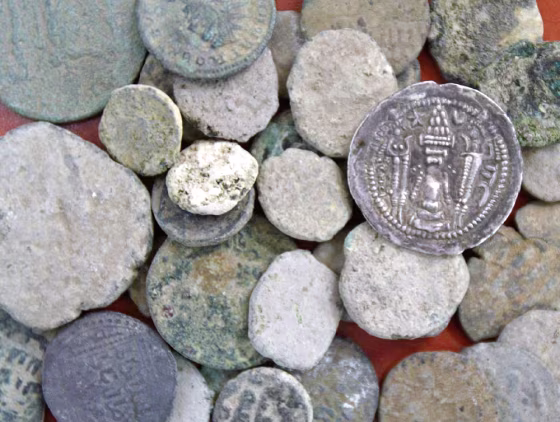 Ancient coins are displayed after their recovery from grave looters in Jerusalem