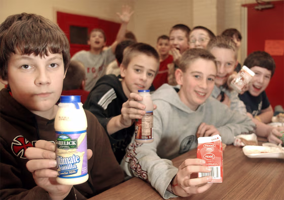 Students at Woddbury Middle School show of their choice for milk containers at lunch in Salem, N.H.,&nbsp;Dec. 17.
