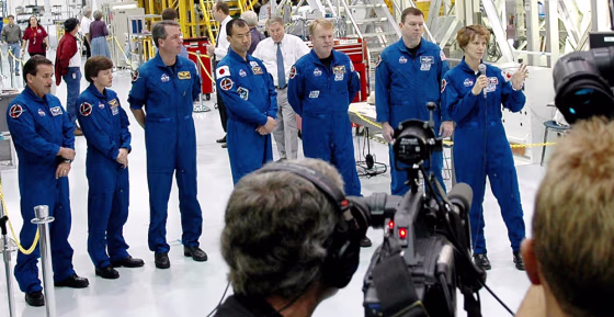 The crew of the upcoming shuttle mission faces reporters Thursday at NASA's Kennedy Space Center in Florida. From left are Charles Camarda, Wendy Lawrence, Stephen Robinson, Soichi Noguchi, Andrew Thomas, James Kelly and commander Eileen Collins.
