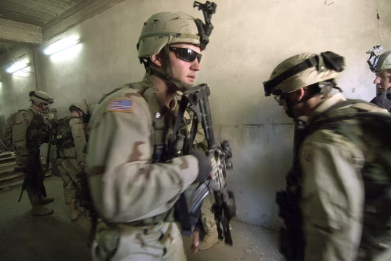 U.S. Army 1st Battalion, 24th Infantry Regiment soldiers search for insurgents in Mosul&nbsp;on&nbsp;Monday.