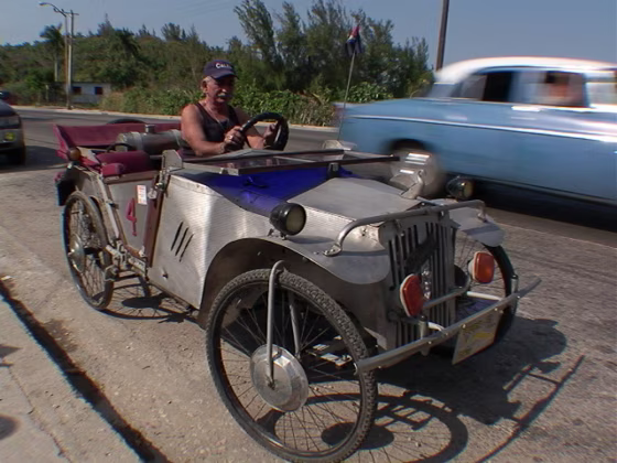 Juan Martinez Rangel drives his prized possession, a car assembled over a 20-year period with&nbsp;a pile of scrap metal and junkyard parts.