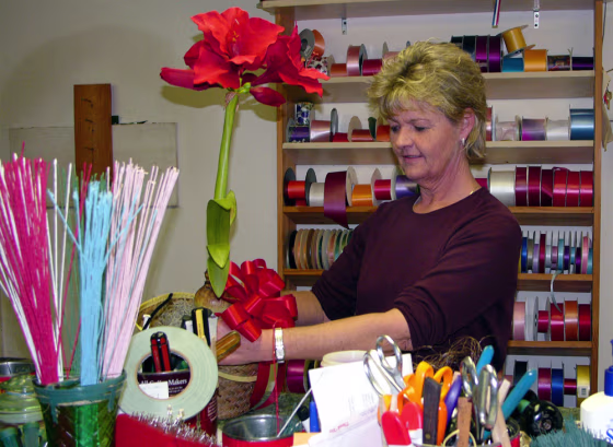 Sharon Webb, owner of The Flower Shop in Nashville, Ga., supplied more than 90 wreaths and other floral items for funerals last month.
