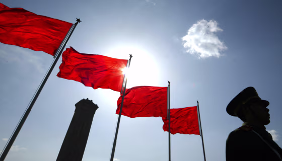A Chinese policeman stands guard at Tiananmen Square in Beijing