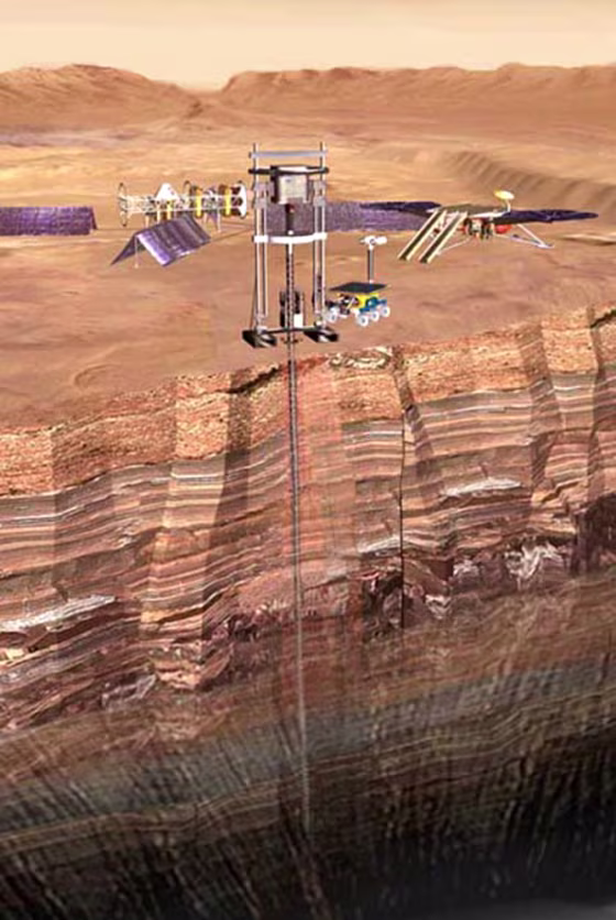 An artist's conception shows a drilling operation designed to probe Mars' deep subsurface. Astrobiologists say microbes could find a&nbsp;suitable environment in caves or even rock fractures, protected from ultraviolet radiation.