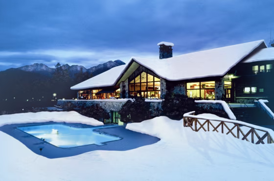 Main lodge and pool at&nbsp;the Fairmont Jasper Park Lodge.