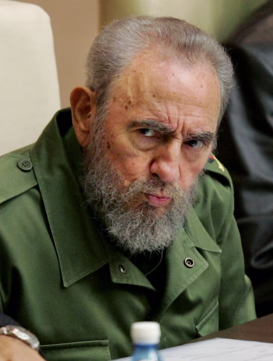 Cuban President Castro addresses audience during closing of economists conference