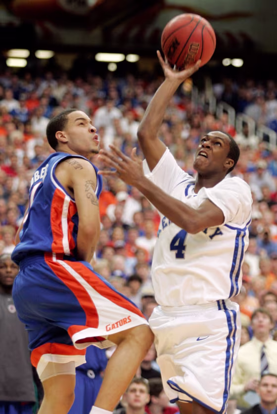 Kentucky Rondo shoots over Florida Roberson during SEC tournament final in Atlanta