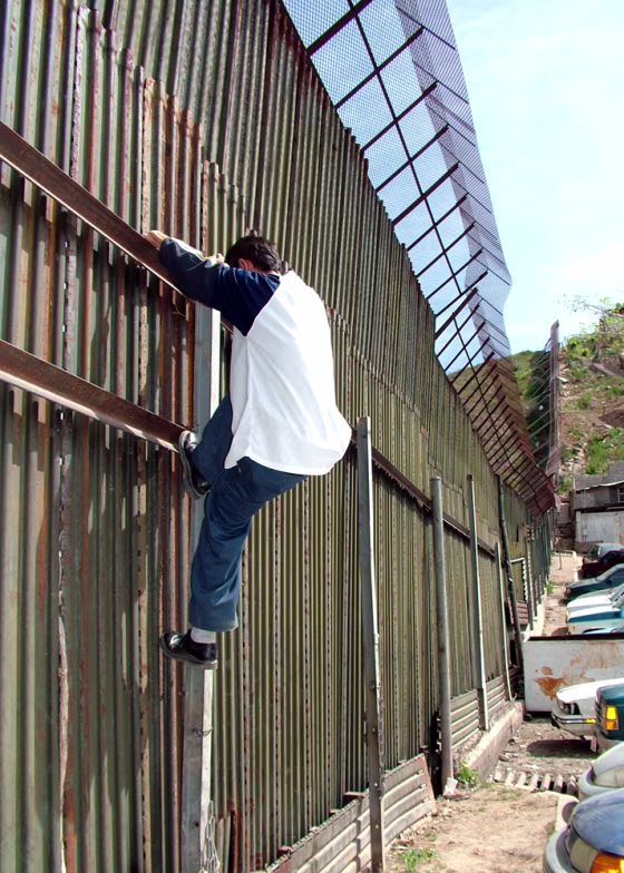 CLIMBING BORDER WALL