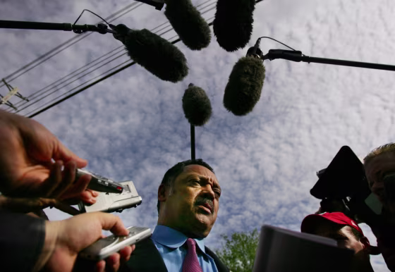 Reverend Jesse Jackson speaks to the media in front of the Woodside Hospice