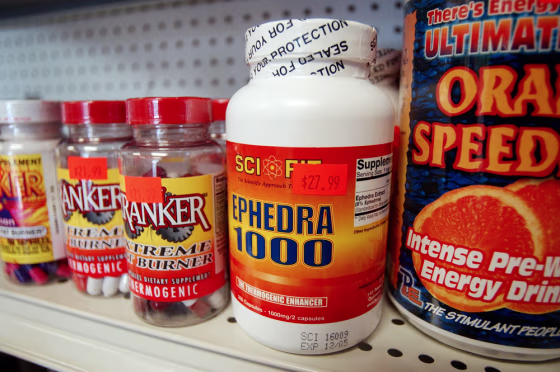 Bottles of dietary supplements that contain ephedra sit on shelves at a store in Watertown, Mass., in this Dec. 31, 2003 photo. A federal judge on Thursday struck down the FDA ban on ephedra.