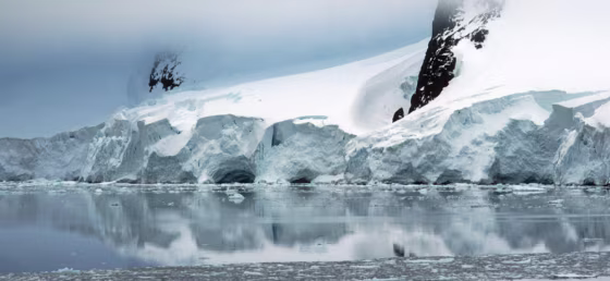 A glacier looms off the coast of the Antarctic Peninsula.