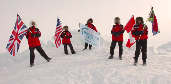 Expedition team&nbsp;members plant their&nbsp;flags at the North Pole, mirroring Robert Peary's 1909 expedition. From left are George Wells, Matty McNair, Tom Avery, Hugh Dale-Harris and Andrew Gerber. 