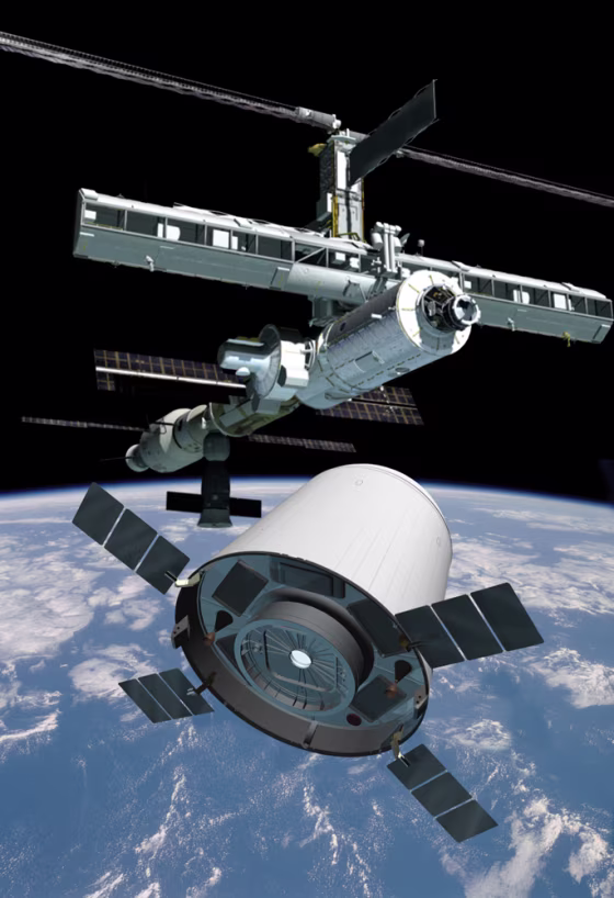 In this artist's conception, the t/Space Crew Transfer Vehicle, or CXV, approaches the international space station. NASA's administrator says he's willing to consider contracting out space station resupply services, and eventually crew transport services as well.