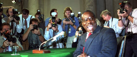 Clarence Thomas in September 1991, moments before the start of a grueling nomination&nbsp;hearing before the Senate Judiciary Committee. The Senate ultimately voted to confrim Thomas as an associate justice, but by the slimmest margin in 20th century Senate history.