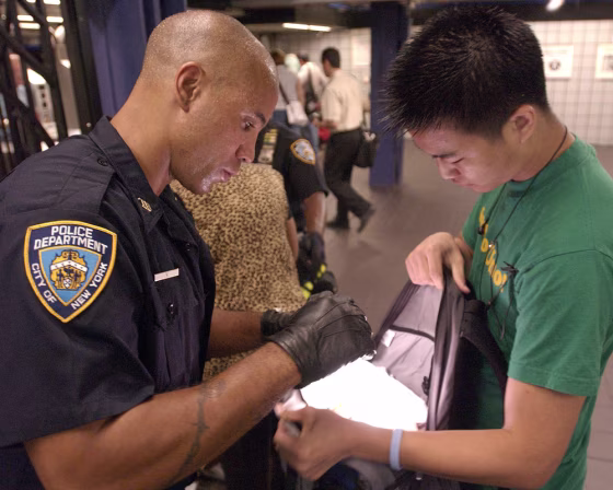 Police officers patrol the 42nd Street Port Authority subway station  in New York