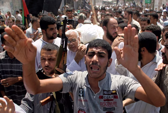 Mourners at the funeral procession of Islamic Jihad militant Yehya Abu Taha, said to be one the gunmen who opened fire on vehicle, killing two Israelis, in the Rafah refugee camp, Sunday.