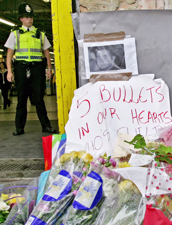 A British police officer stands outside Stockwell Underground station in south London