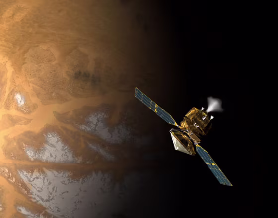 An artist's conception shows NASA's Mars Reconnaissance Orbiter above the Red Planet's surface.