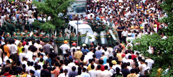 - CHINA OUT - Chinese riot police try to