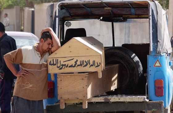 Scores Killed, Wounded In Baghdad Triple Bombing