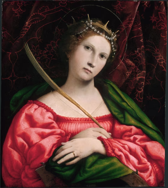 Venetian artist Lorenzo Lotto's "Saint Catherine." A&nbsp;senior conservation scientist at the National Gallery of Art discovered artists had mixed tiny bits of glass with their pigments, which enhanced the glint of the colors. 
