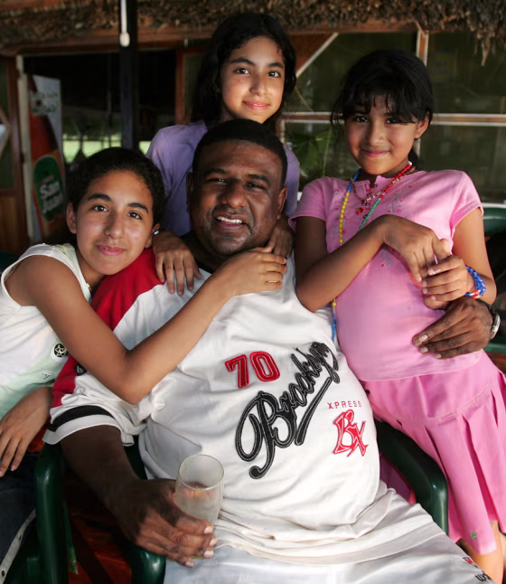 Plane crash survivor Jose Leandro Vivas poses with his daughters Joshelyn, 15, left, Jacquelyne, 12, above, and Jharline, 10, right, and&nbsp;during an interview in Pucallpa, Peru, on Wednesday.