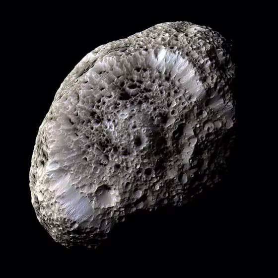 This false-color view of Hyperion reveals crisp details and differences in color across the moon’s surface that could represent differences in the composition of surface materials.