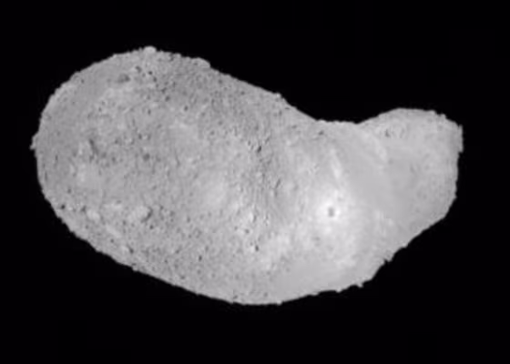 This view of the asteroid Itokawa was captured by Japan's Hayabusa spacecraft on Saturday from a distance of about 1,640 feet (500 meters). The probe's shadow can be seen as a dark mark on the asteroid's surface.