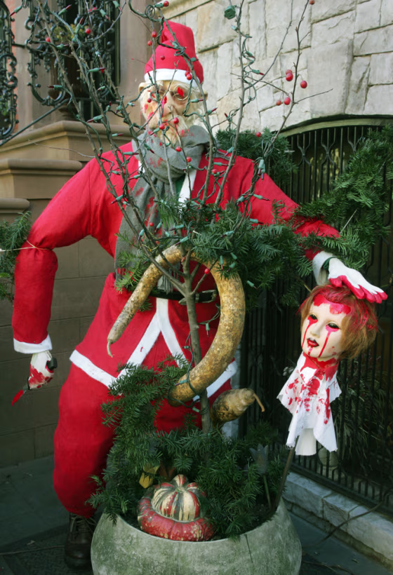 A New York couple’s holiday display includes a 5-foot-tall Santa holding a bloody doll’s head. They say it’s a fun way to comment on the commercialization of Christmas, but some neighbors weren't catching their holiday spirit.