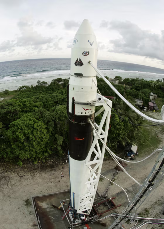 SpaceX's Falcon 1 rocket is readied for launch on its launch pad on a Pacific island.