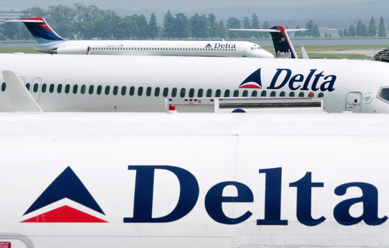 File photo of Delta Airlines jets seen at a terminal at Reagan National Airport outside Washington
