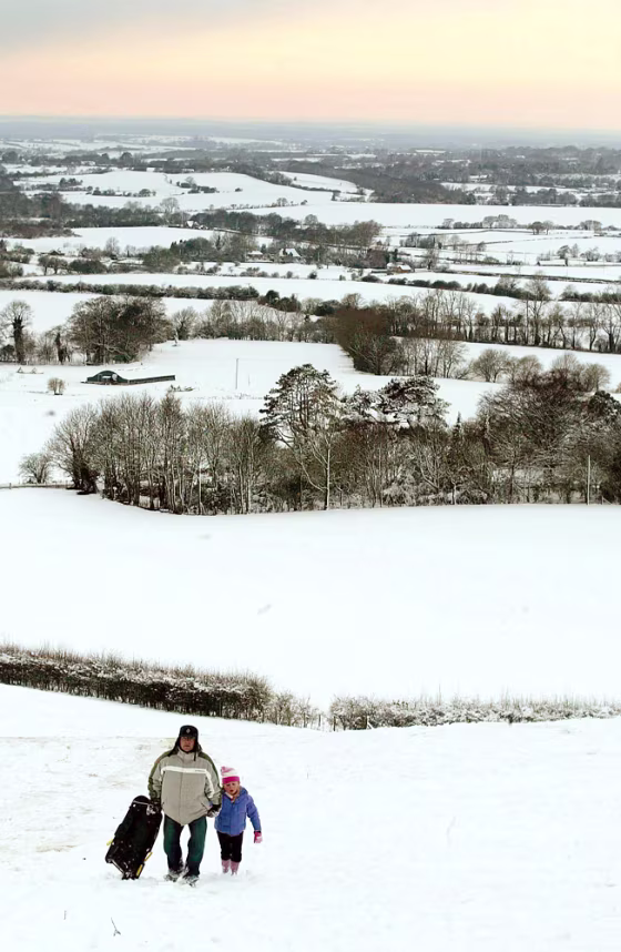Much of Britain, including this hillside in Hythe,&nbsp;is coated white after snow fell Wednesday and Tuesday.