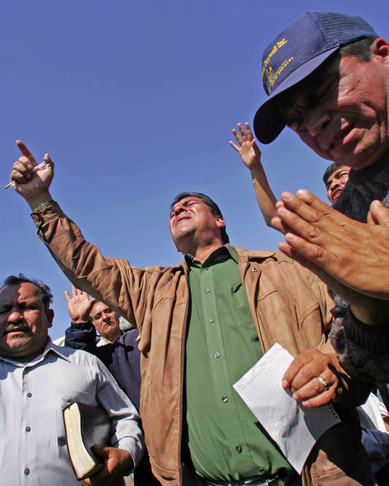 Members of diverse religious groups pray