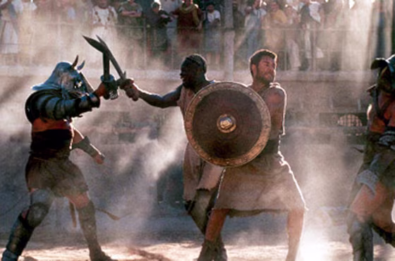 Juba and Maximus (Djimon Hounsou and Russell Crowe) are in the middle of gladiatorial combat in this scene from the movie "Gladiator." Evidence from tombs in Turkey&nbsp;suggests that such fights followed strict rules, and that there&nbsp;may have been&nbsp;a procedure for dispatching the dying backstage.