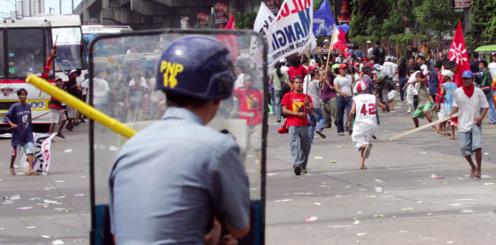 RIOT POLICE PROTESTERS