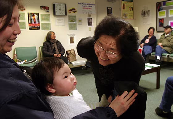 Angela Zheng, 9 months,&nbsp; and mother Flora Zheng accompany grandmother Qi Chen to MobileMed's Pan Asian Health Clinic, where doctors share a language and culture with patients, making treatment that much easier.