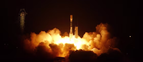 A Boeing Delta II rocket carries NASA's Aura satellite on July 15, 2004, from Vandenberg Air Force Base, Calif. The satellite, on a $785 million mission to study Earth's atmosphere, is part of NASA's Earth Observing System, a program considered at risk due to budget constraints.