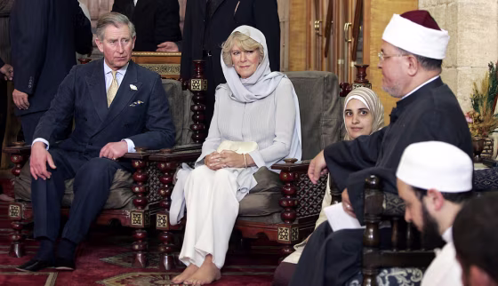 Britain's Prince Charles and his wife, Camilla, listen to a Koran lesson in the Al-Azhar Mosque in Cairo on Tuesday during a&nbsp;five-day&nbsp;visit to Egypt.