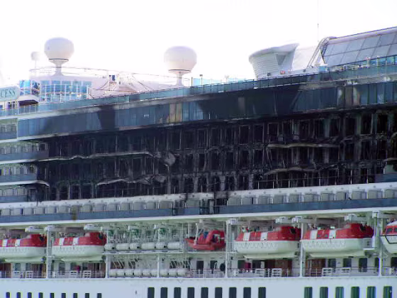 The blackened outside of the Star Princess shows that the fire covered several floors of the cruise ship.