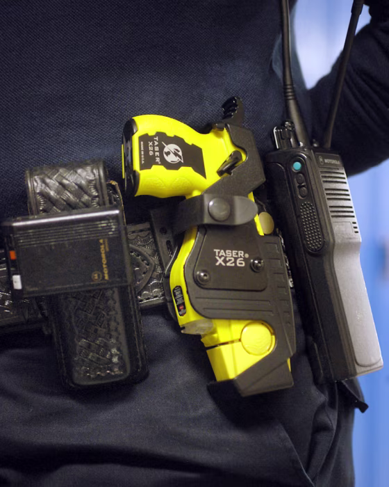 Taser guns, such as this one shown on&nbsp;St. Paul, Minn.,&nbsp;police officer Julie Maidment, are legal in 43 states.