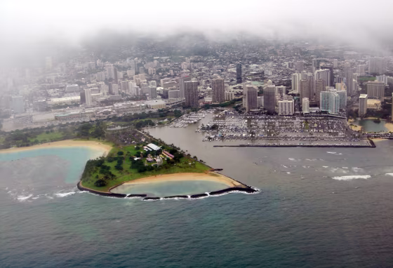 Water darkened by raw sewage pours out of the Ala Wai Canal and harbor area&nbsp;in Honolulu on Wednesday. 